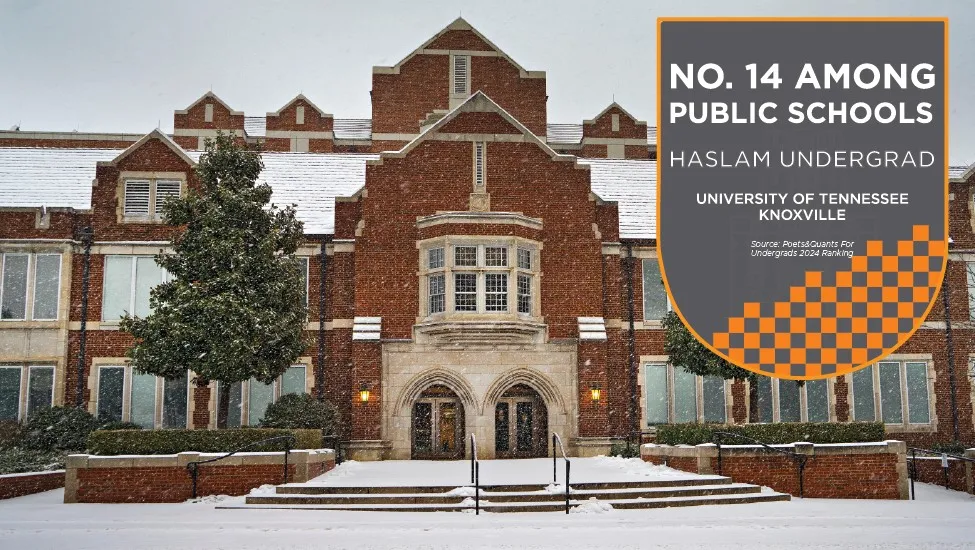 A gray and orange text box with white text reading that Haslam ranked # 14 among public schools in Poets & Quants undergrad rankings for 2024 is superimposed in the upper right corner of an image of a snowy Haslam Business Building.