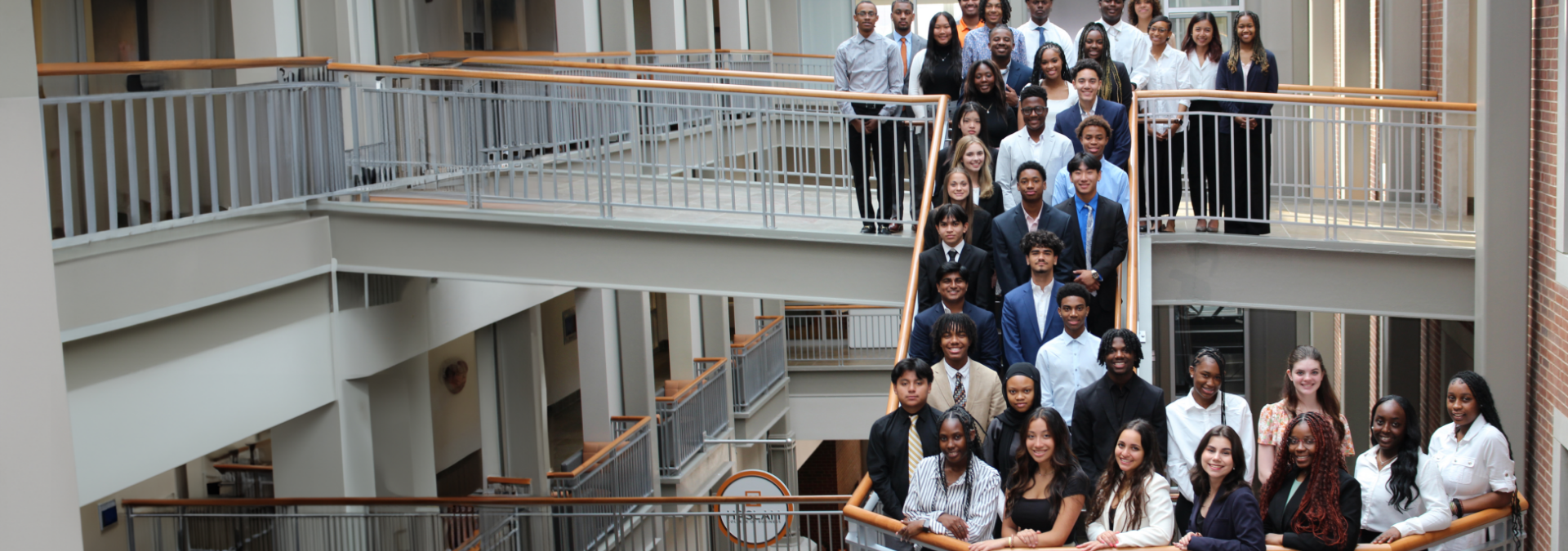 BETS students on a staircase