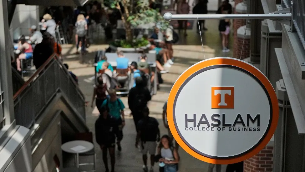 Overhead shot of students walking through the Haslam College of Business atrium