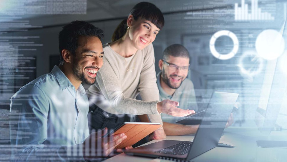 Three multiethnic professionals working together on a data analytics problem using holographic imagery and cloud computing.