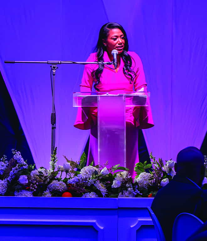 Megan Turner speaking at awards