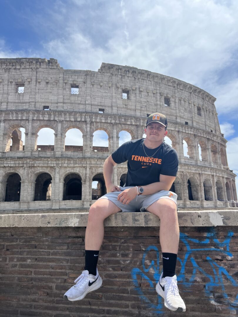 Christian Weaver in front of Roman Coliseum
