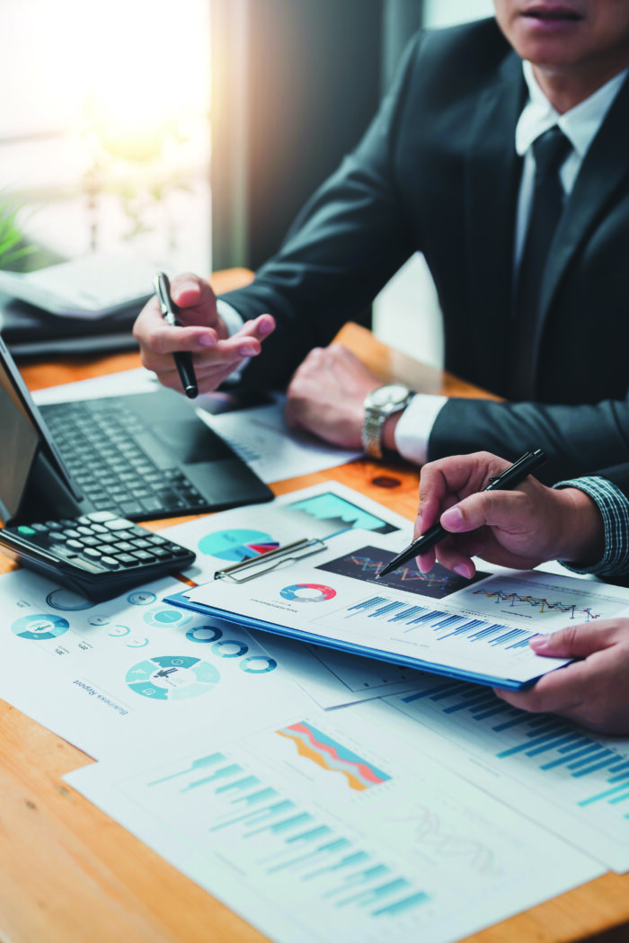 Business People Meeting To Find Marketing Investment Analytical
