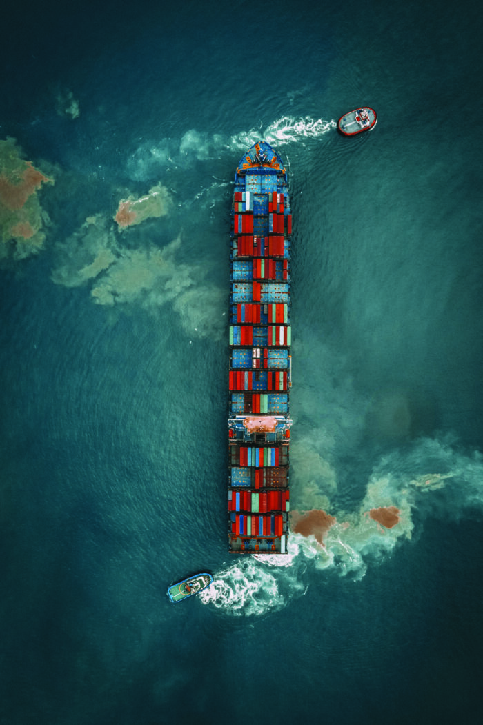 Container freight ship sailing.