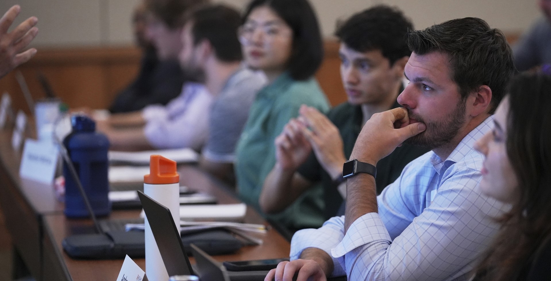 Student Looking At Professor