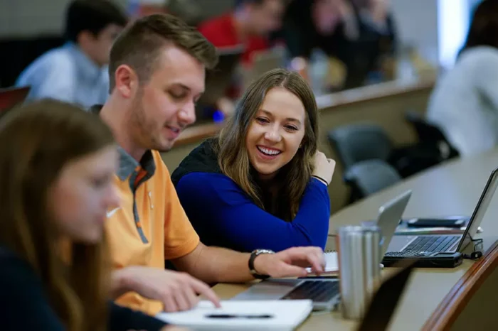 Students In Class On Computers