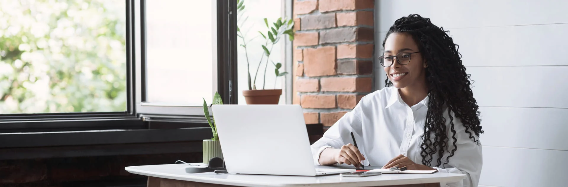 Female Student Working on Laptop