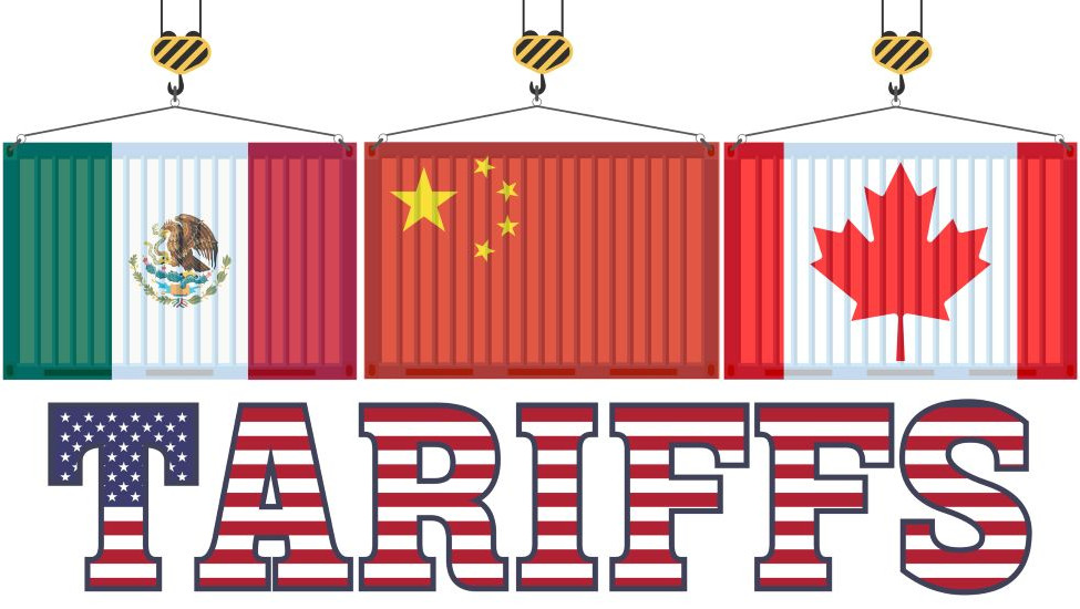 A stylized image of three cargo containers, suspended by crane hooks representing the national flags of Mexico, China and Canada, hang above the word, "Tariff," which is filled with the United States flag's stars and stripes.