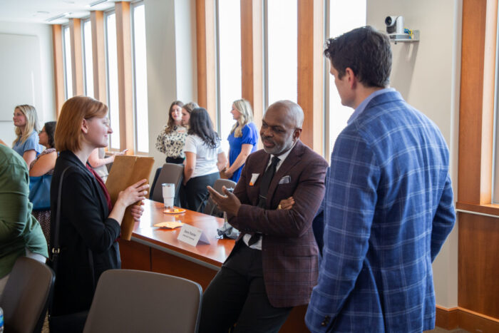 Attendees at Executive HR Leadership Roundtable network in the Haslam Business Building